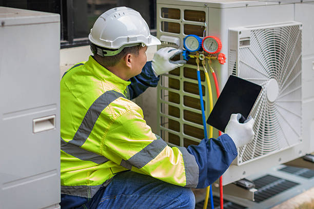 Professional Hvac technician working in White Hall, IL